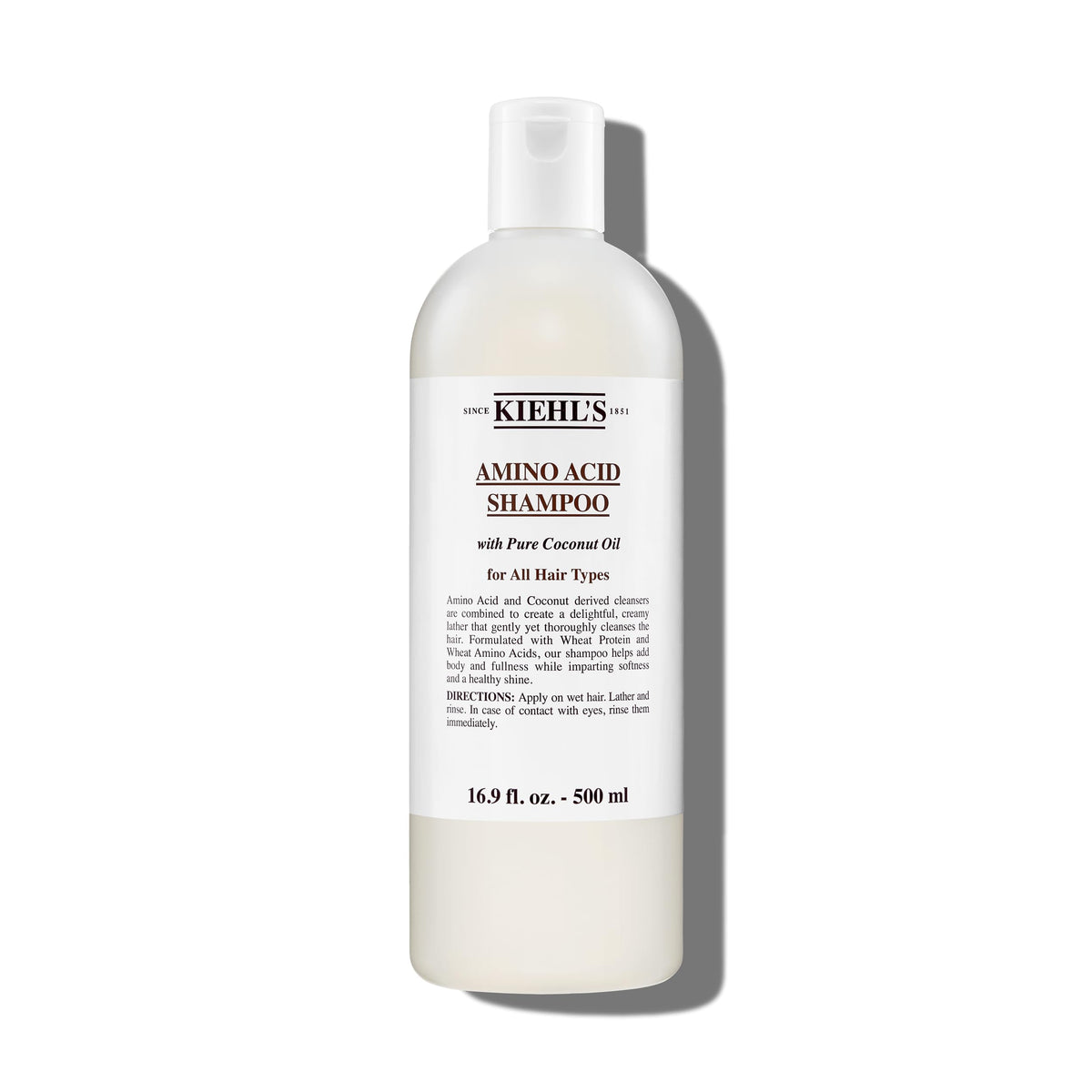 Flacon Kiehl's Amino Acide Shampoo pour une hydratation douce des cheveux.