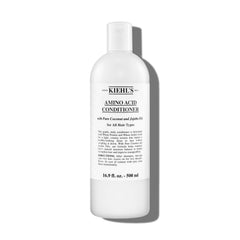 Kiehl's Amino Acid Conditioner flacon élégant démêle et apporte de la brillance.