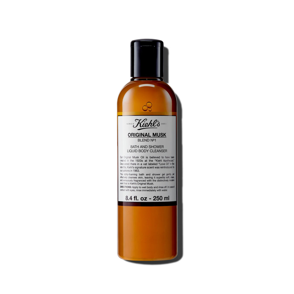 Kiehl's Original Musk – flacon en gros plan et mousse satinée prête à l'emploi.