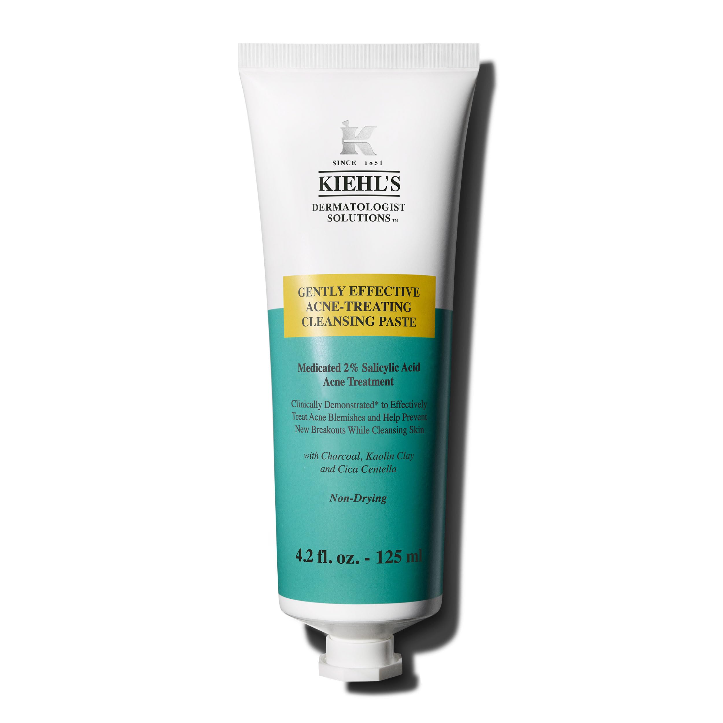 Kiehl’s Pâte Nettoyante Anti-Acné en bouteille, nettoie sans dessécher.