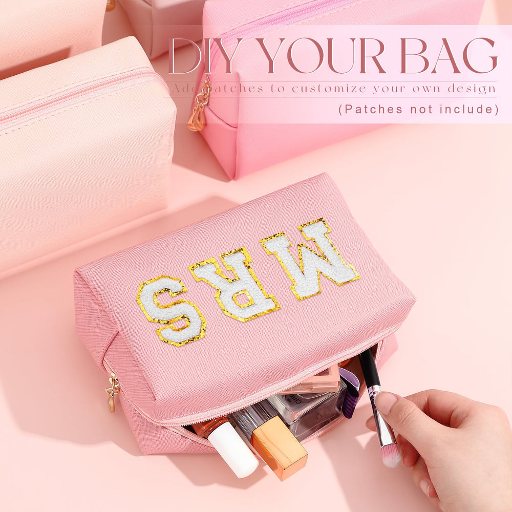 Pochette de toilette Kigeli en PU rose, parfait compagnon de voyage.