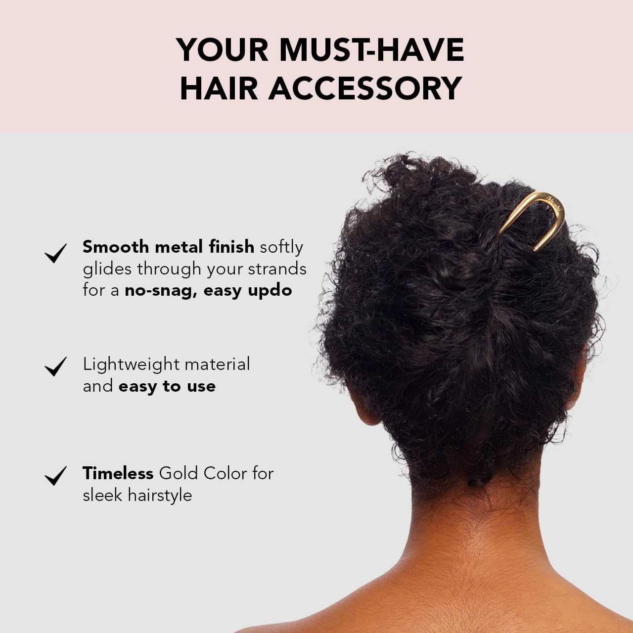 Kitsch épingle cheveux dorée, offre un style rapide et chic.