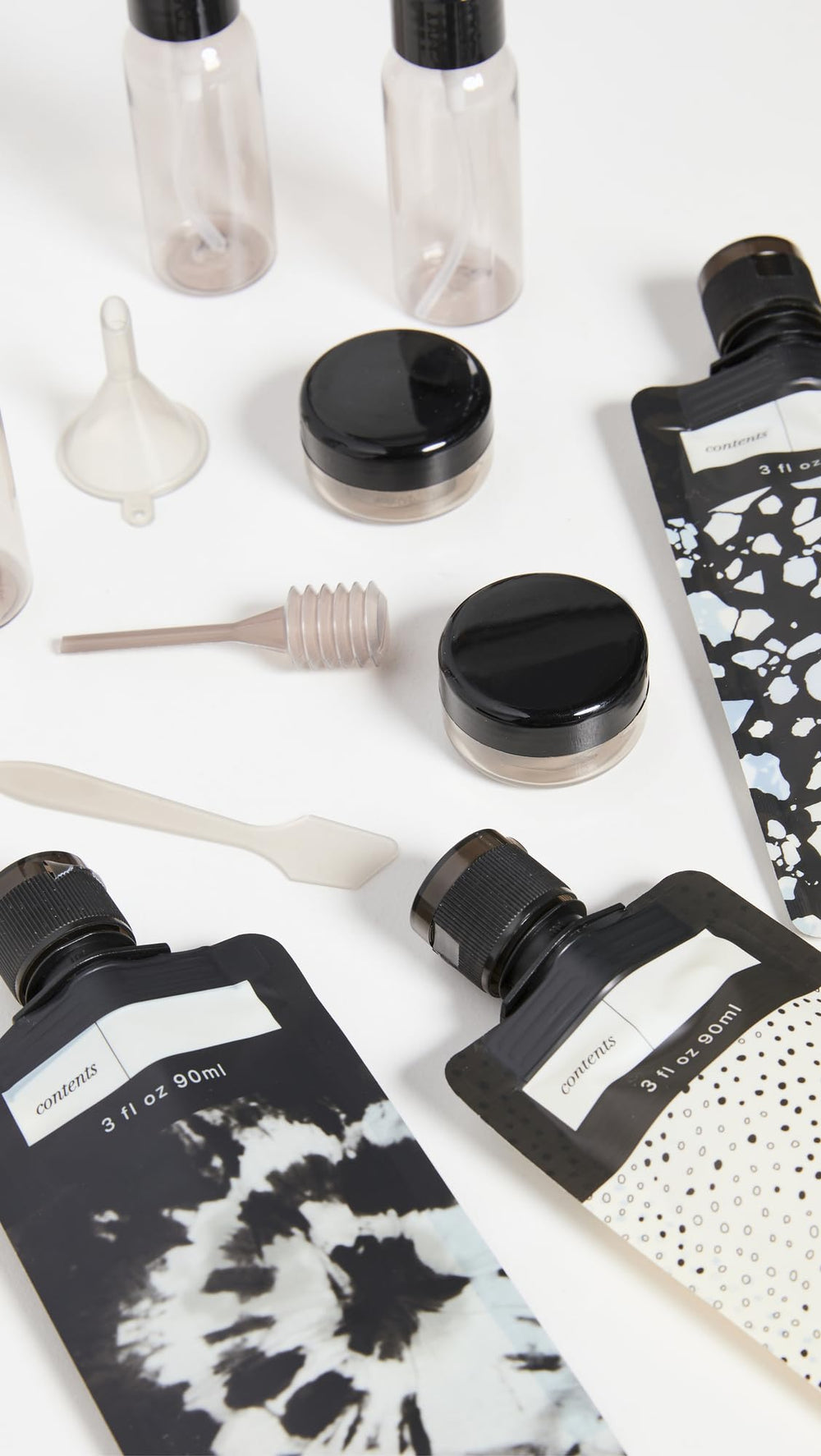 Flacon pompe 30ml noir Kitsch, idéal pour shampoing en déplacement et anti-fuites.