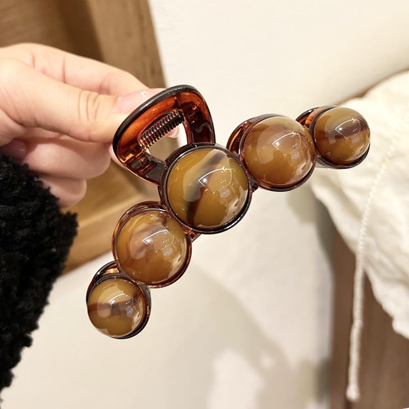 Kolonams pince perle brune – allure elegante pour tous types de cheveux