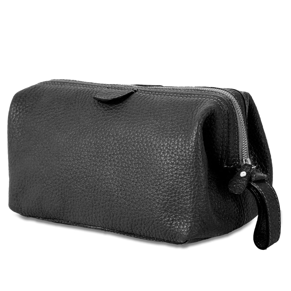Poignée pratique de transport sur la trousse KomalC pour voyager facilement.