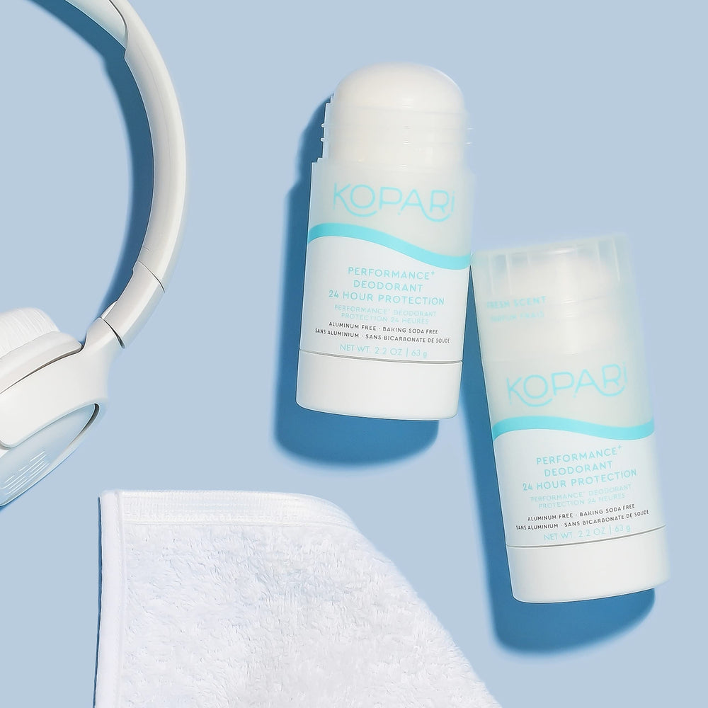 Kopari Performance Plus packaging box communicates clean, plant-based care in a compact 2 oz format