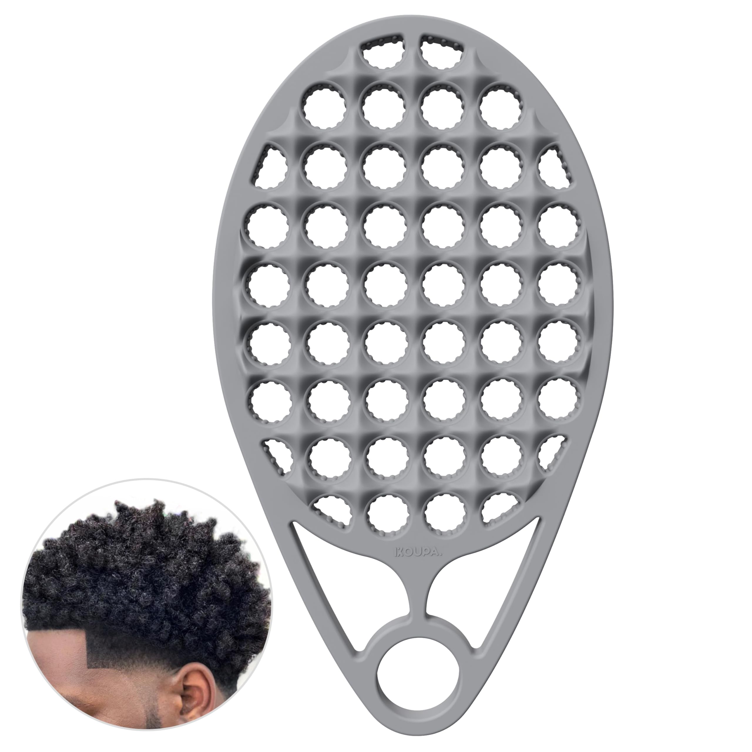 Brosse silicone KOUPA monobloc pour boucles afro, massage et coiffage faciles.