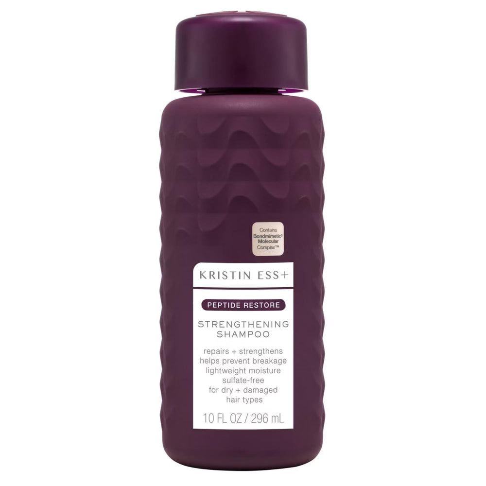 Kristin Ess Shampoing antifade en bouteille — préserve la couleur et la brillance.