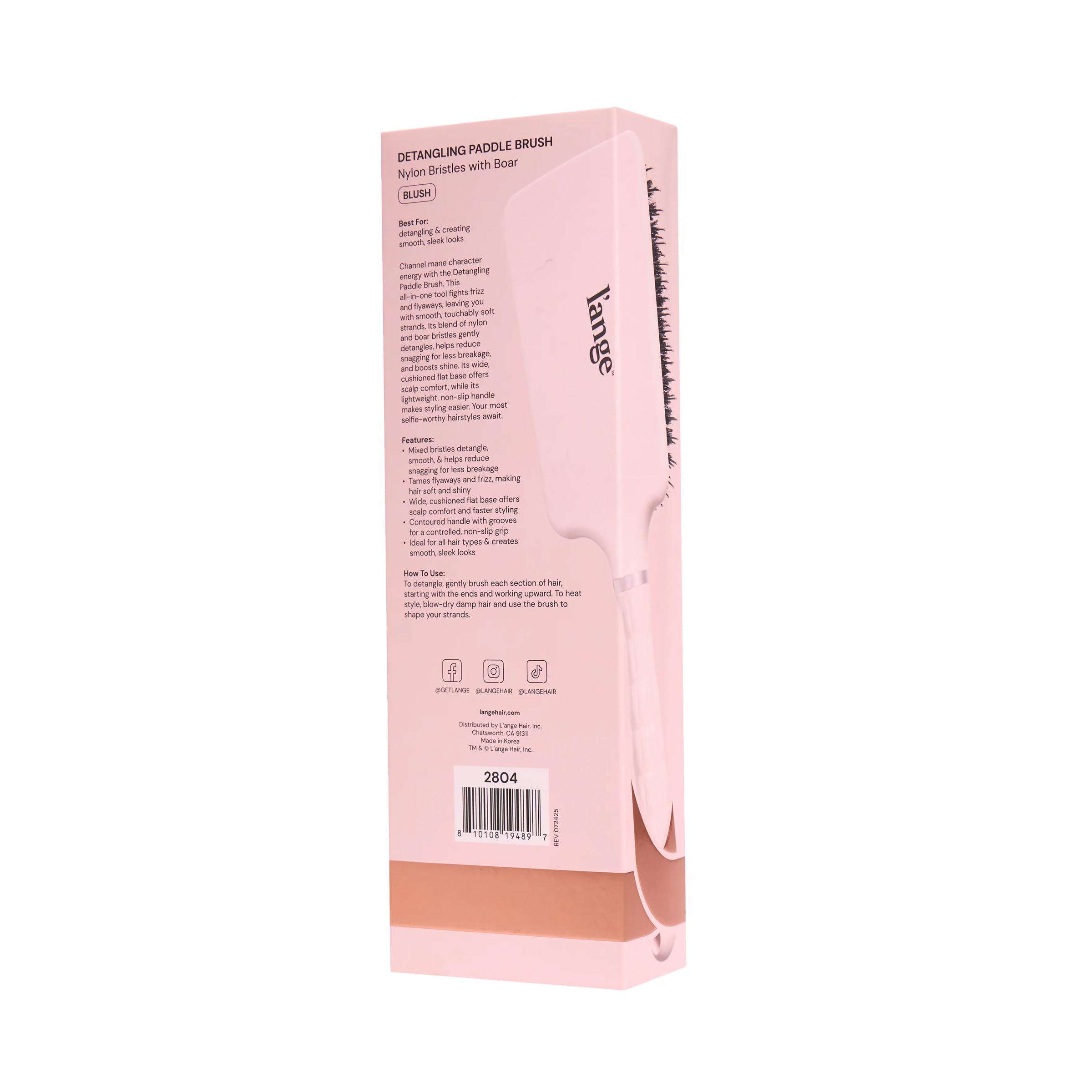 Brins nylon et bois du peigne L'ANGE HAIR assurant une brillance naturelle.