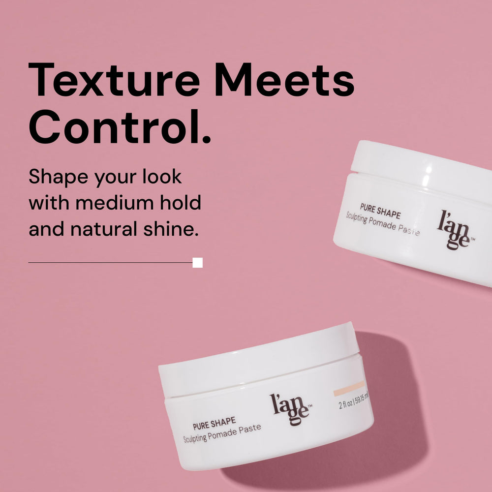 L'ANGE HAIR paste application in hands for textured, versatile shaping with hydration.