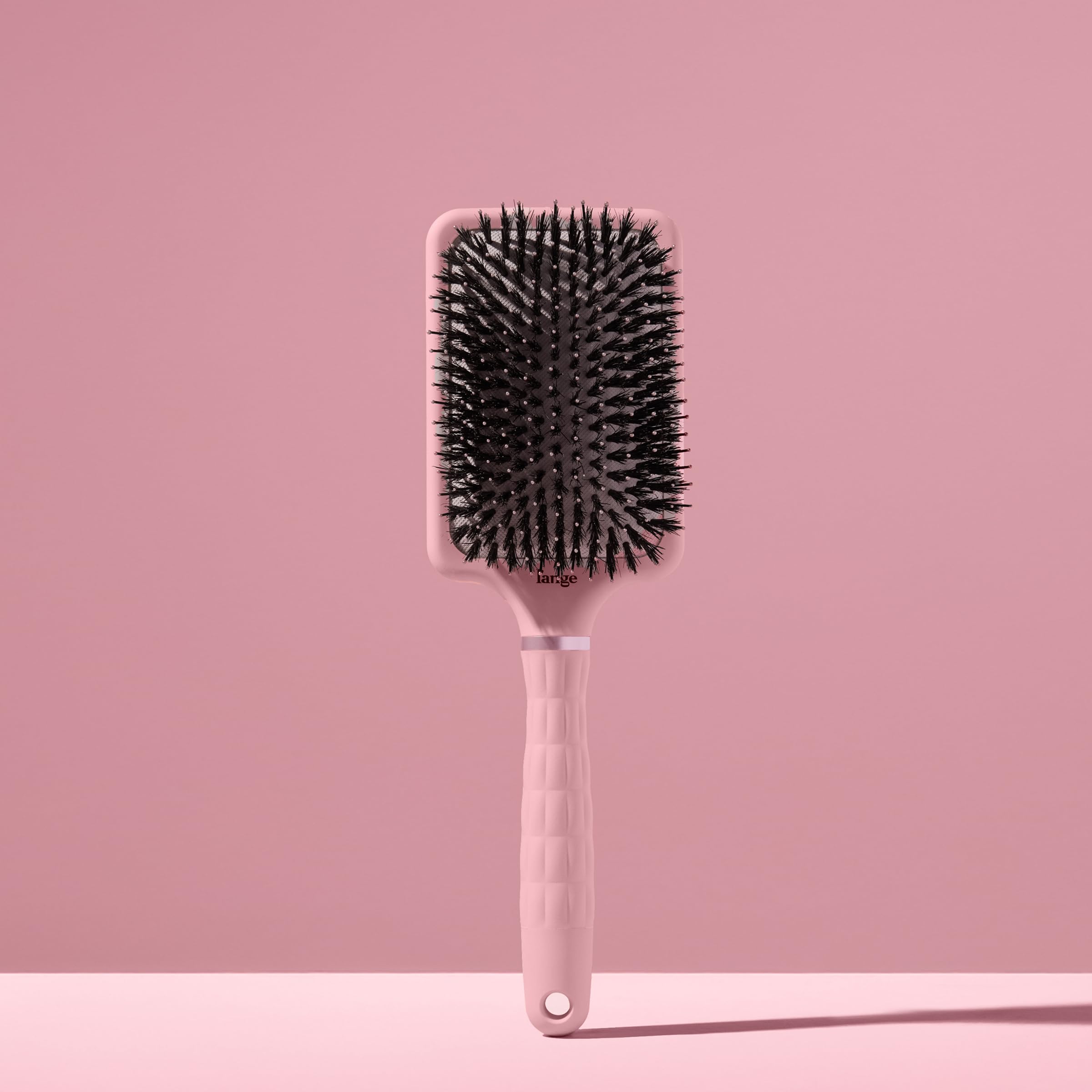 Utilisation quotidienne rapide sur cheveux épais et fins avec ce peigne.