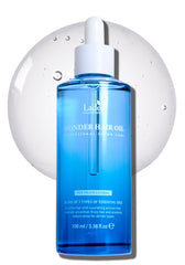 LA'DOR huile capillaire : bouteille élégante et frisottis maîtrisés.