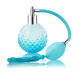 Lamoutor bouteille parfum vintage bleu avec pompe, pratique pour application précise.