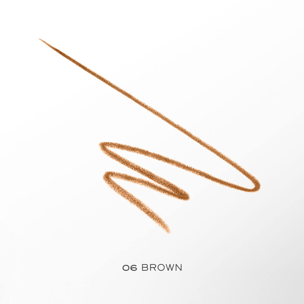 Lancôme brosse-sourcils pour peigner et fixer l'aspect avec soin.
