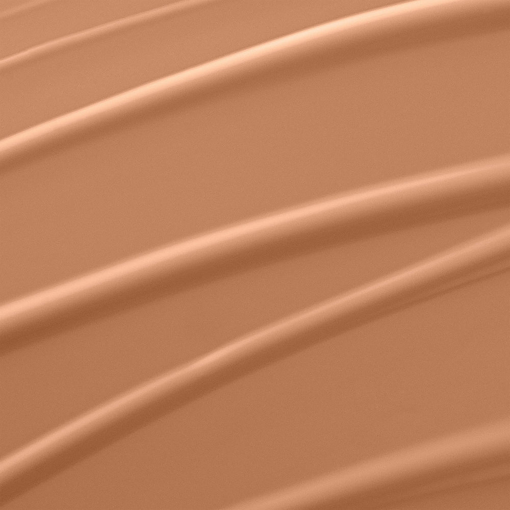 Texture glissante du fond de teint pour une application facile et uniforme.