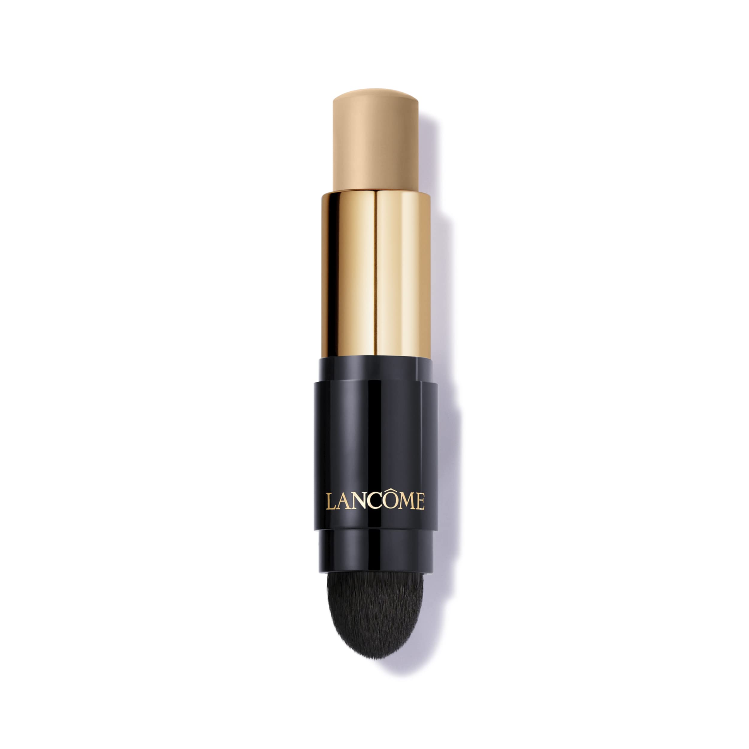 Lancôme Teint Idôle Stick avec brosse Kabuki intégrée pour une application rapide et uniforme.