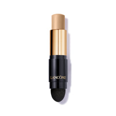 Lancôme Teint Idôle Stick avec brosse Kabuki intégrée pour une application rapide et uniforme.