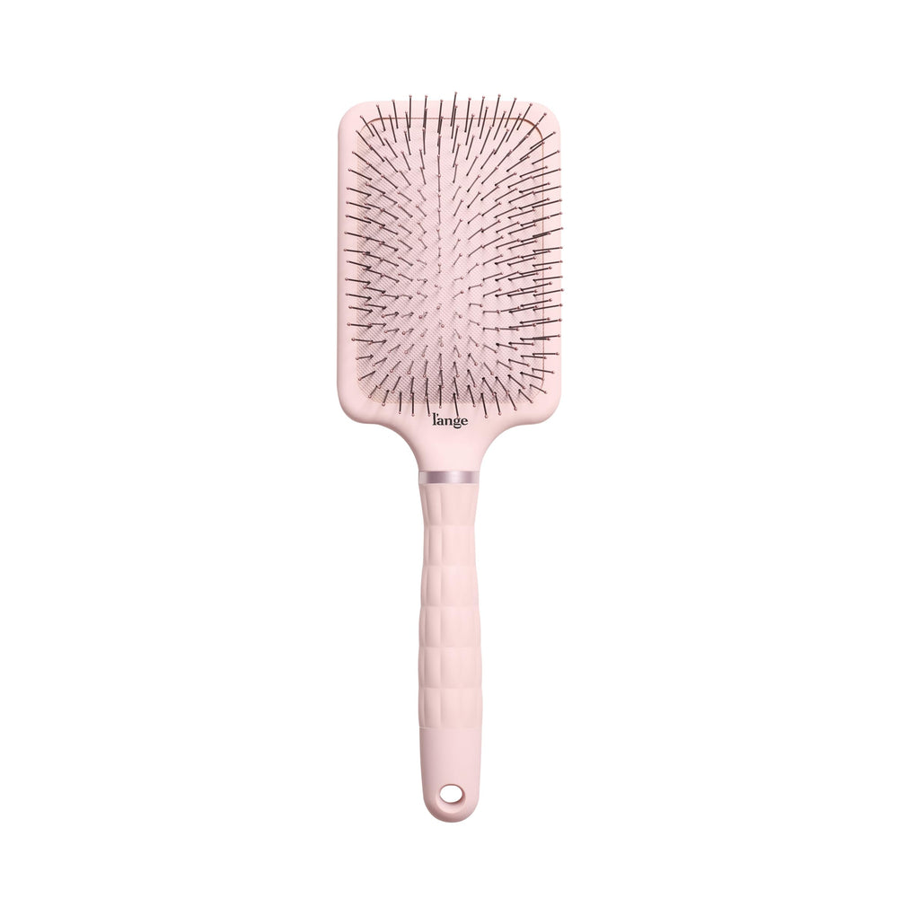 Brosse démêlante plat L'ANGE HAIR, poignée ergonomique pour prise stable.