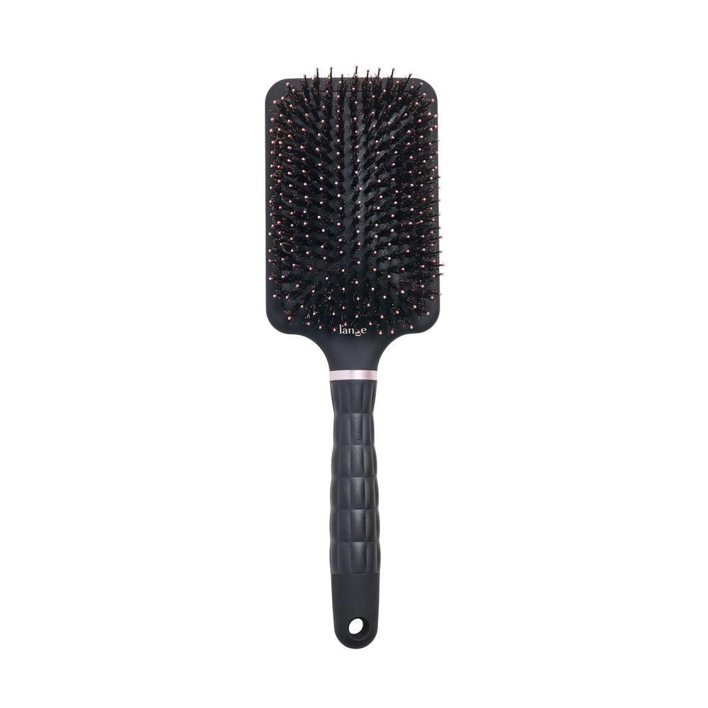 L'ANGE HAIR brosse démêlante convient à toutes les longueurs avec base confortable.