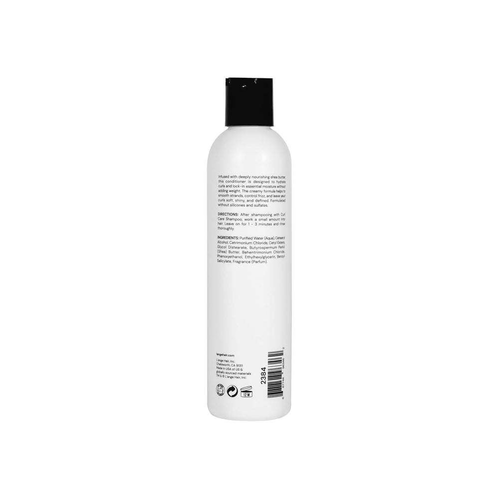 L'ANGE HAIR Curl Care Conditioner bottle on bathroom vanity for daily routine.