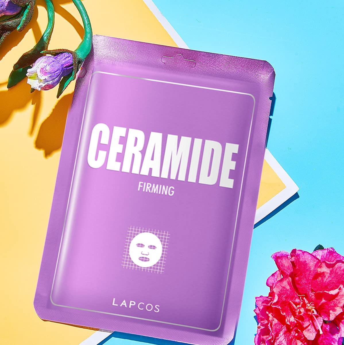 LAPCOS Ceramide Sheet Mask essence droplets on hand illustrate quick skin moisturization.