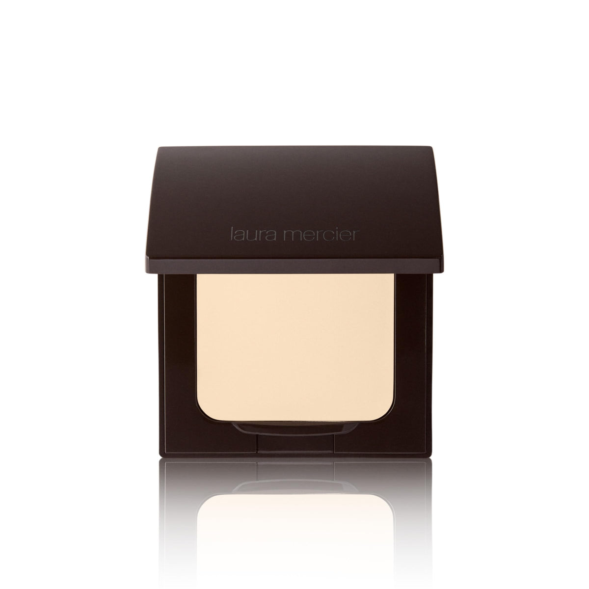 Laura Mercier poudre pressée translucide sur compact avec applicateur inclus, retouches faciles tout au long de la journée.