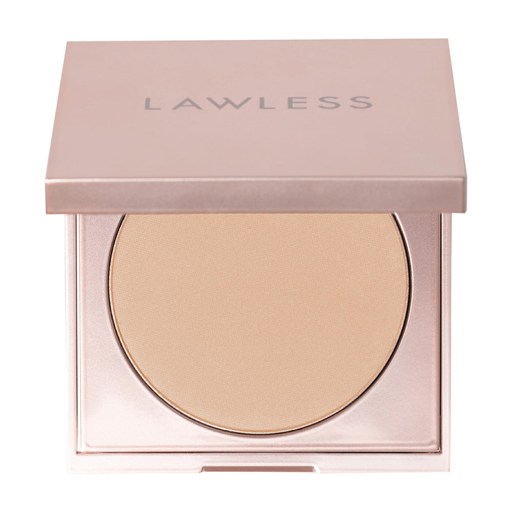Lawless Poudre sans talc clair dans son flacon, texture lisse et naturelle.