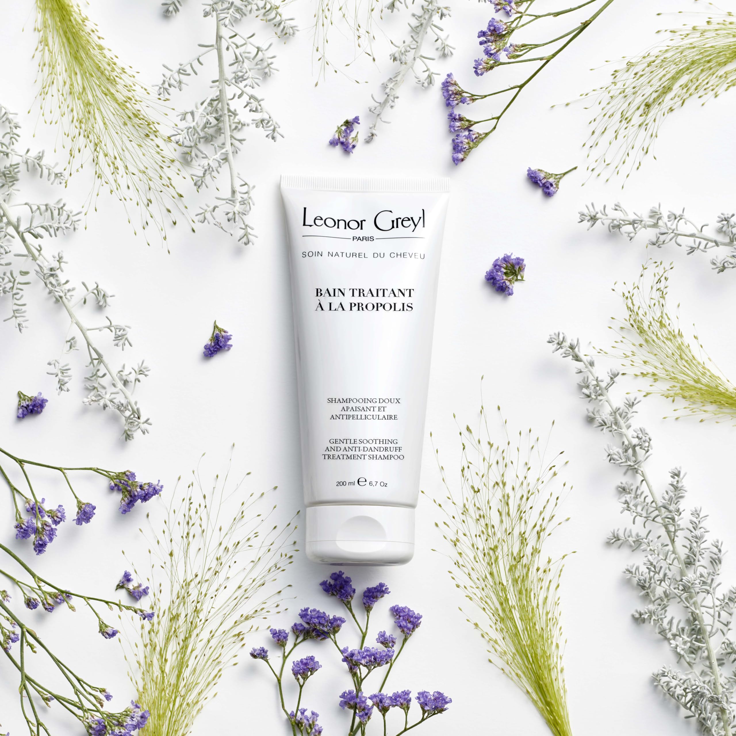 Bain Traitant Leonor Greyl avec propolis et camomille pour cheveux sains.