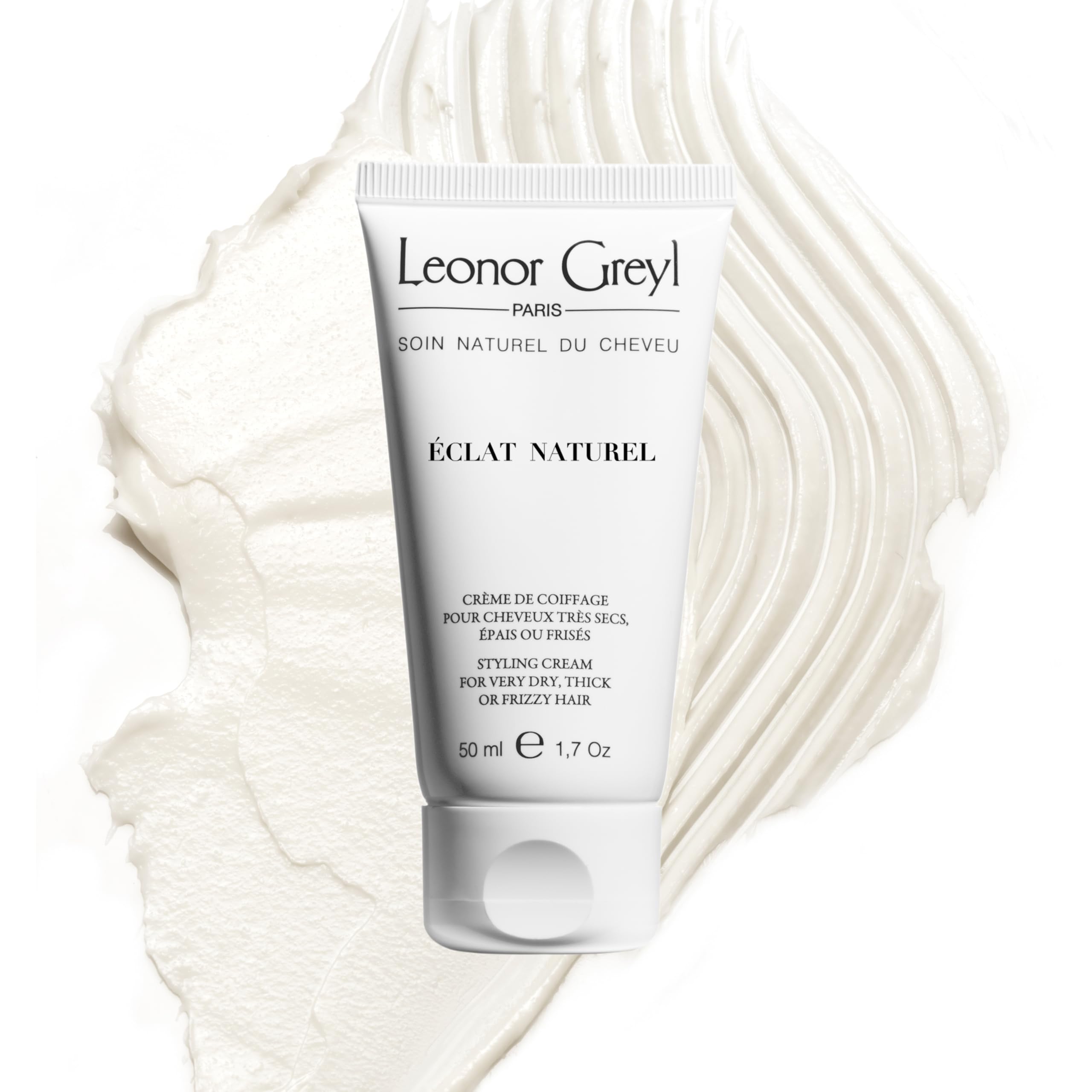 Leonor Greyl Éclat Naturel en bouteille, coiffage fluide et lisse.