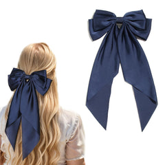 Barrette LFOUVRE noeud satin bleu marine, fixation légère pour cheveux.