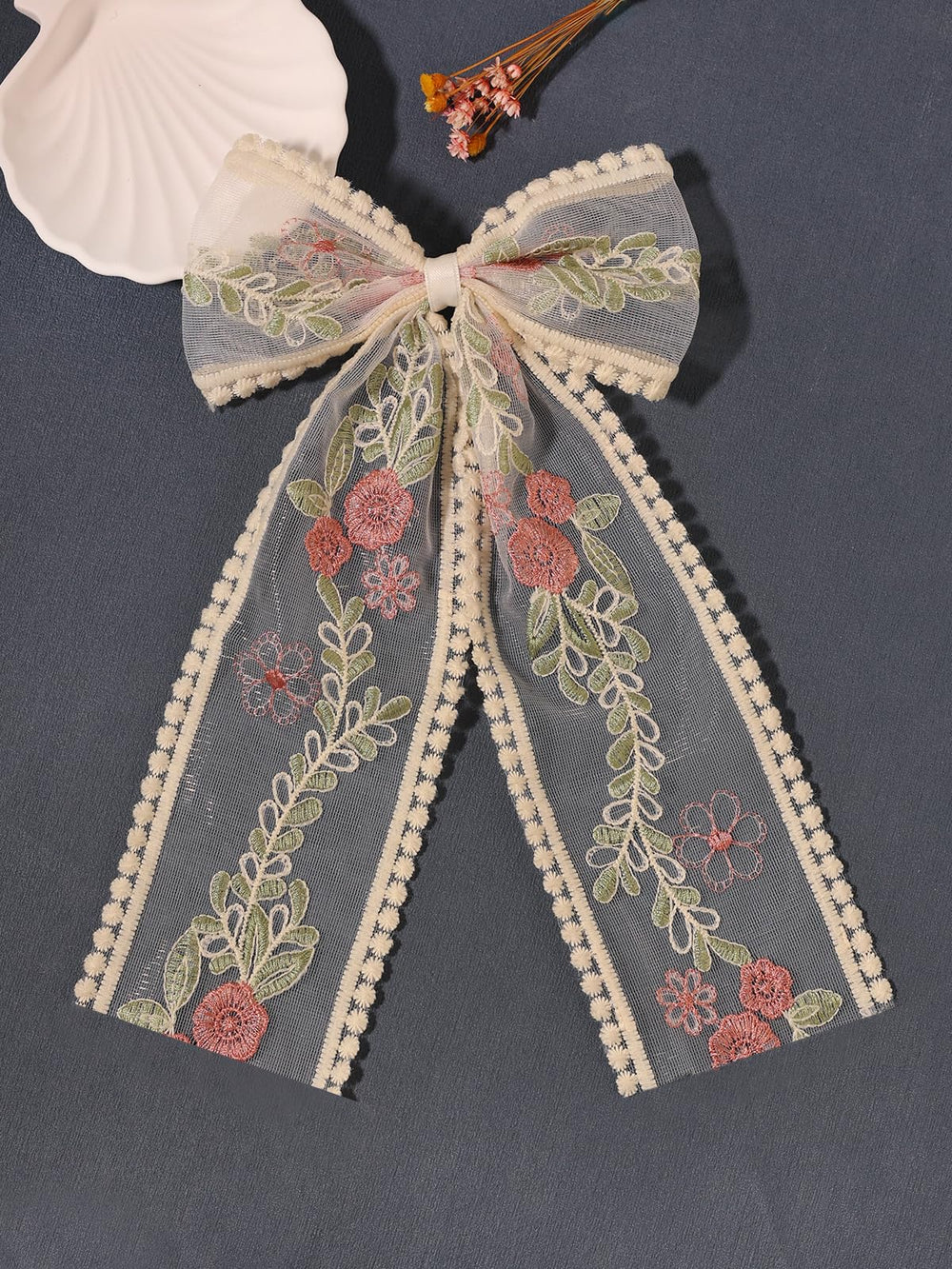 LFOUVRE Noeud dentelle beige à longues extrémités, pour coiffures volumineuses.