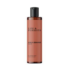 Life & Pursuits Amla Brahmi huile pour cheveux, flacon élégant apportant hydratation.