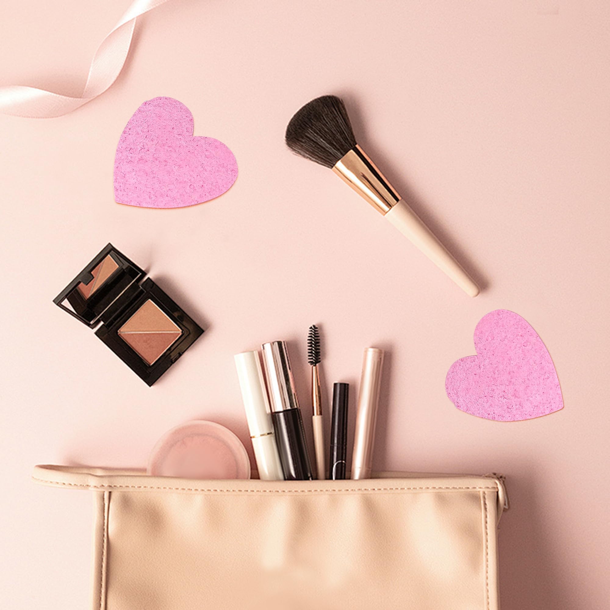 Éponge Lilac cœur rose parfaite pour la routine en voyage.