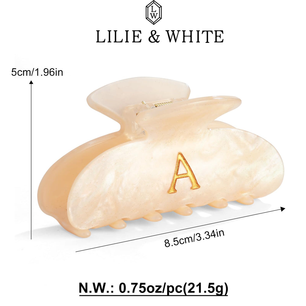 Fermeture fiable du clip Lilie-White assurant un maintien sûr.