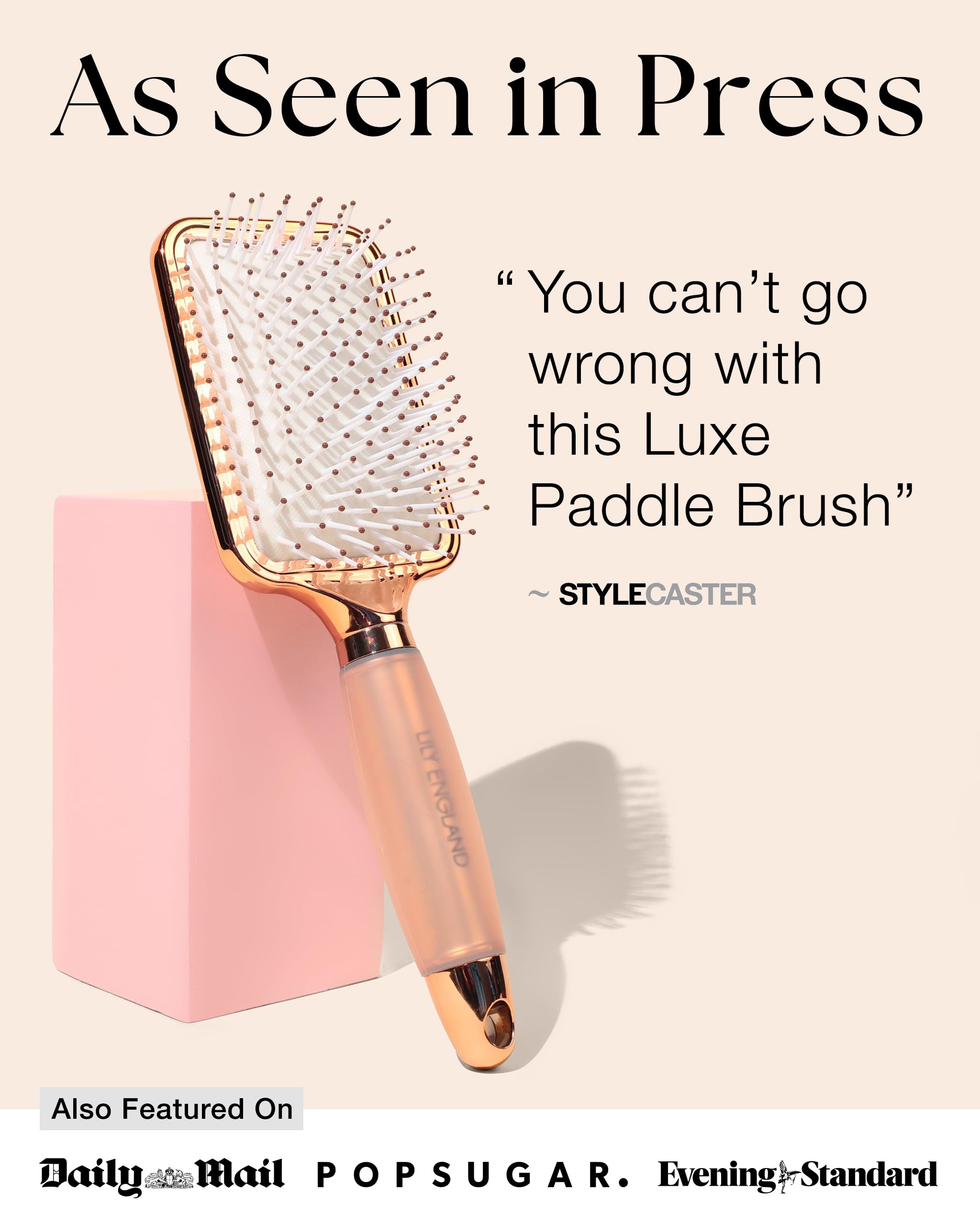 Brosse Lily England Paddle avec manche en gel prise en main confortable.
