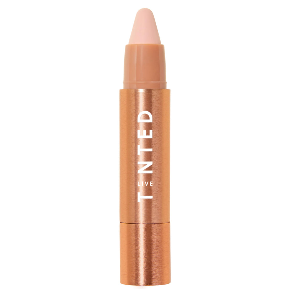 Live Tinted Huestick Aura s'applique facilement sur le visage pour un teint uniforme.