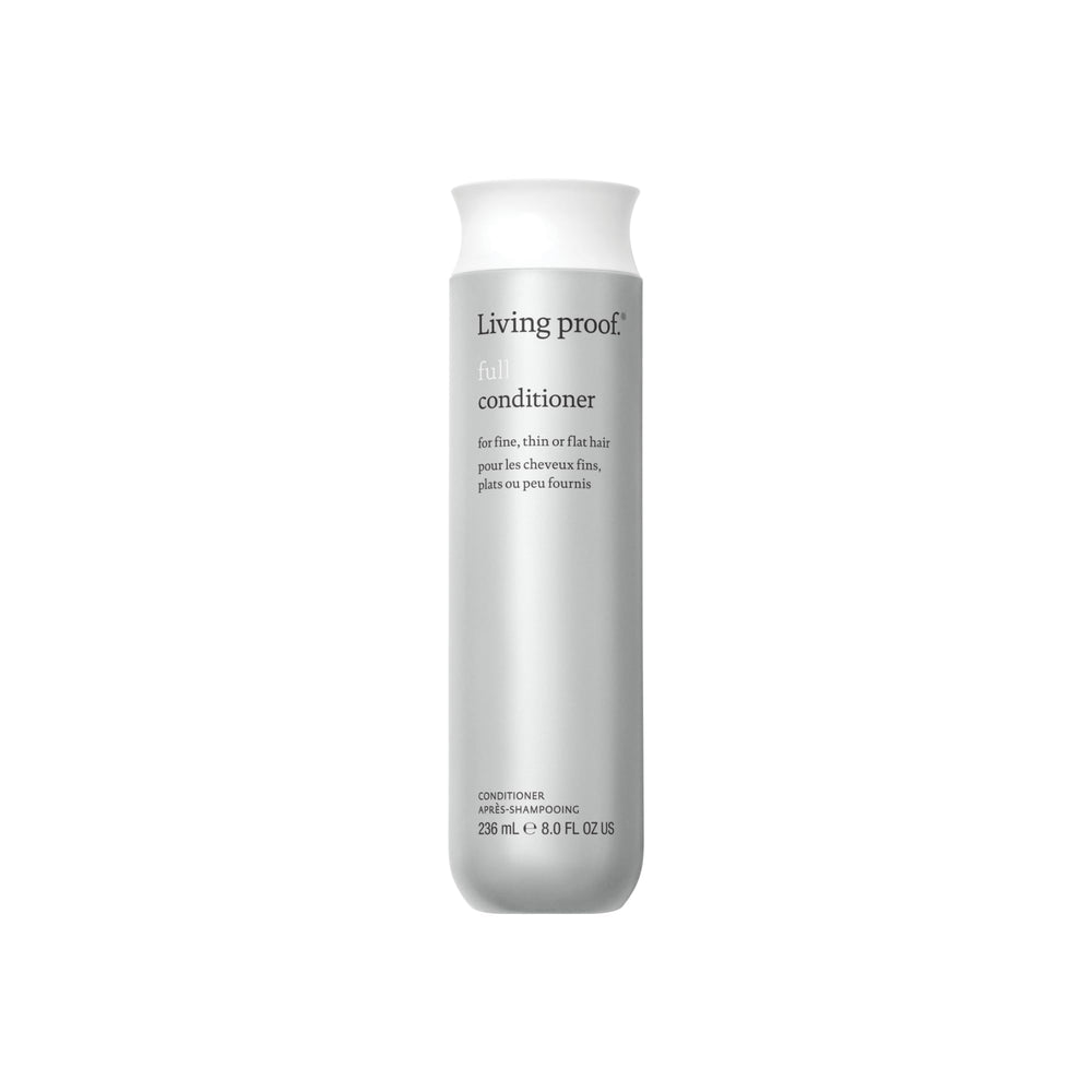 Living Proof – bouteille d’après-shampooing volumisant affichant le volume des cheveux.