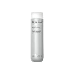 Living Proof – bouteille d’après-shampooing volumisant affichant le volume des cheveux.