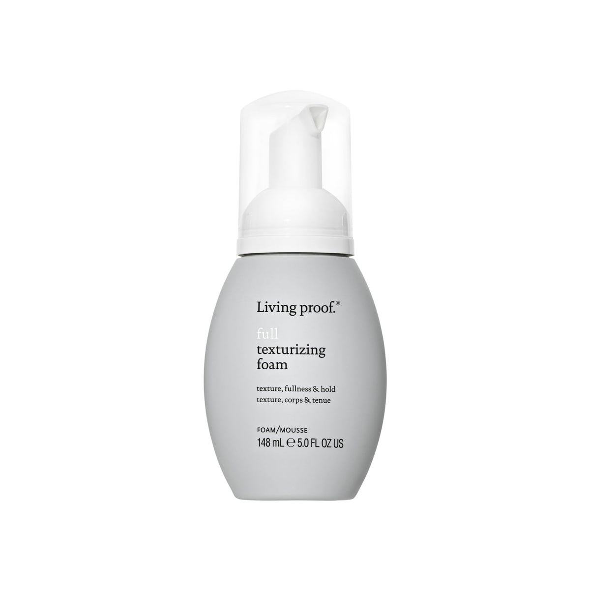 Living Proof Mousse Texturante Complète—flacon en gros plan et texture légère.