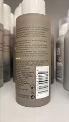 Cheveux lisses et brillants après application de l'huile No Frizz Vanishing Oil.
