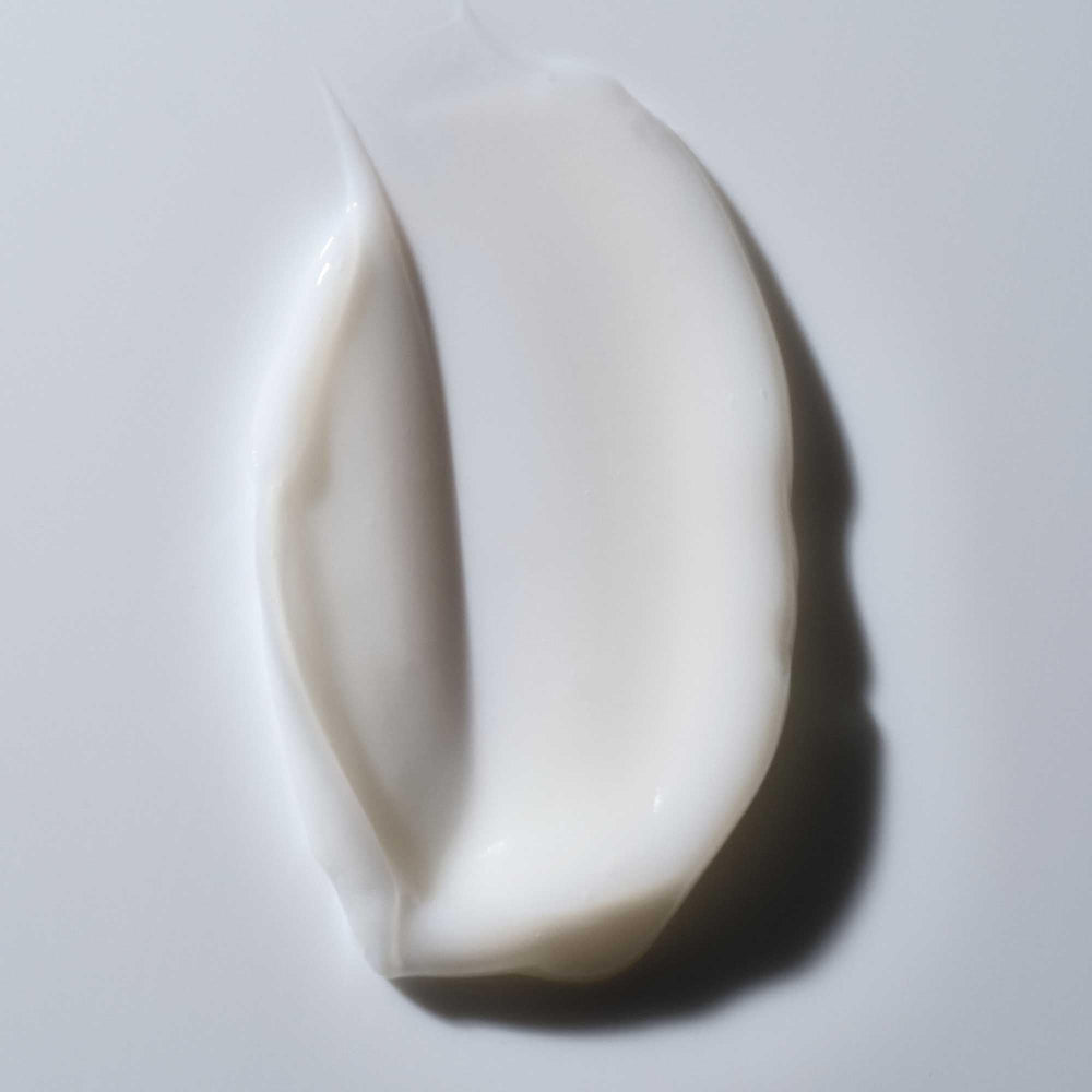 Living Proof Shampoing boucles, cheveux plus définis après lavage.