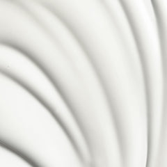 Après utilisation, les cheveux brillants et doux grâce au soin Living Proof.