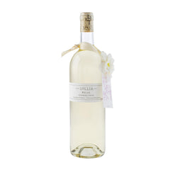 Bouteille design de Lollia Relax prête pour une pause spa luxueuse.