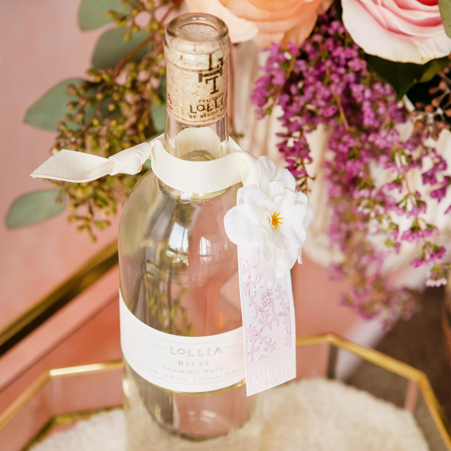 Verre prestige de Lollia Relax évoquant un rituel beauté luxueux.