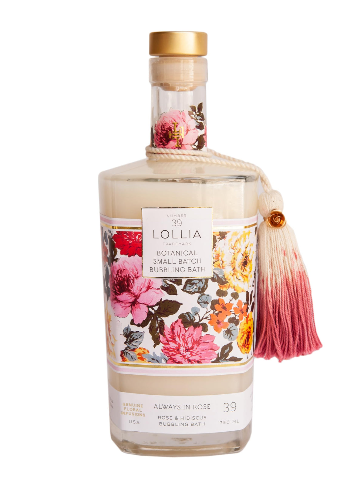 Lollia Toujours en Rose, bouteille en verre entourée de fleurs, expérience spa à domicile.
