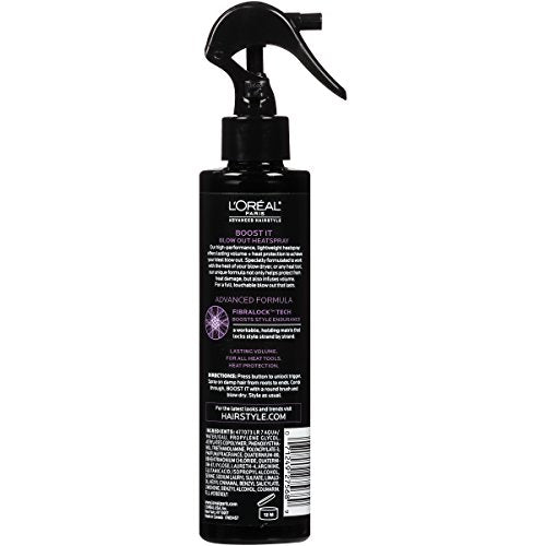 Spray BOOST IT en action offrant une protection contre la chaleur et du volume