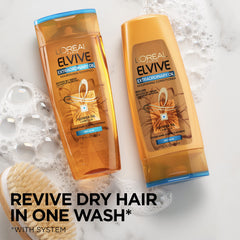 L'Oreal Paris Elvive Extraordinary Oil conditioner texture close-up shows smooth, nourished strands