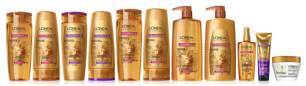 L'Oreal Paris Elvive Extraordinary Oil gives glossy hair on model