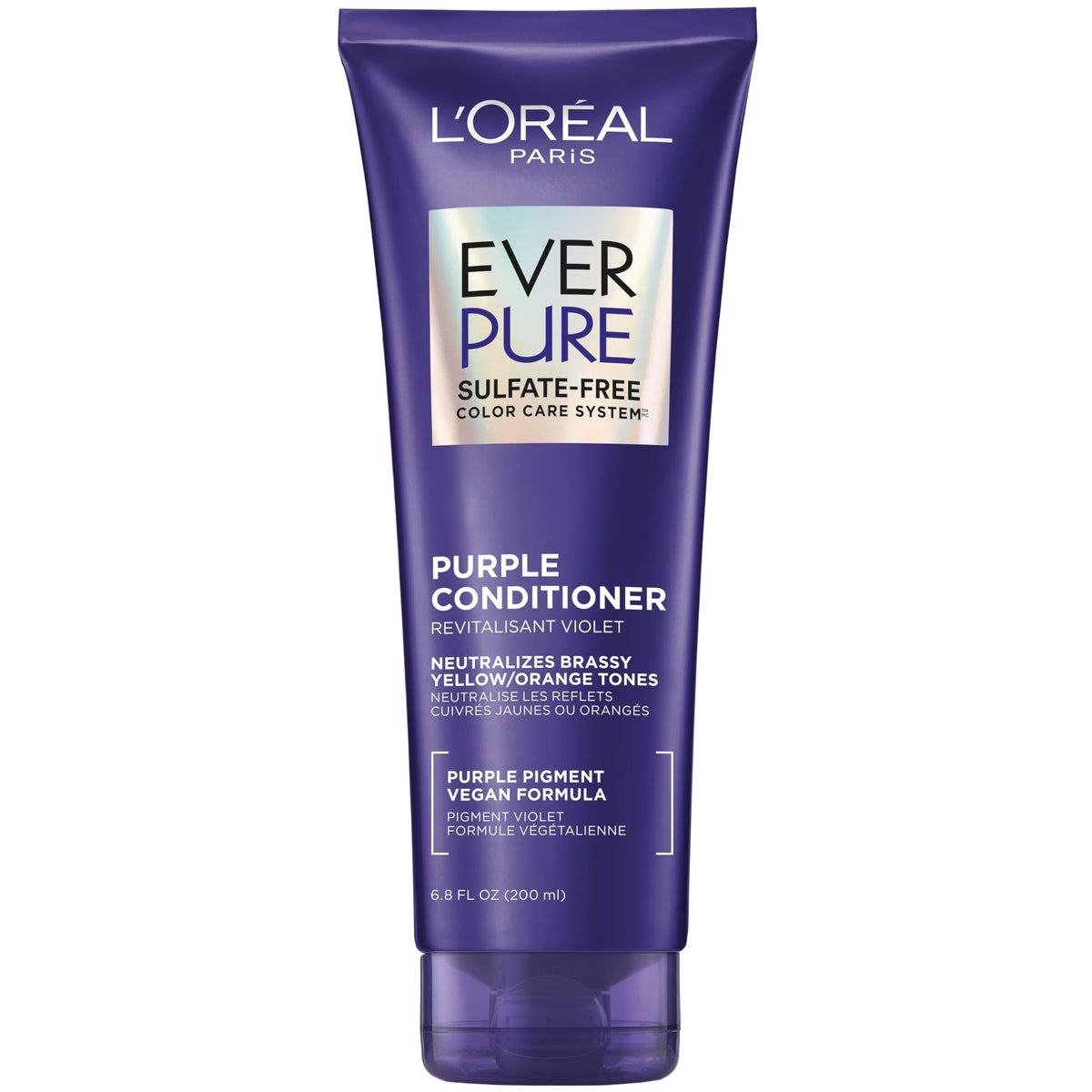 Conditionneur violet EverPure dans une bouteille, neutralise les tons bruns et ravive le blond.