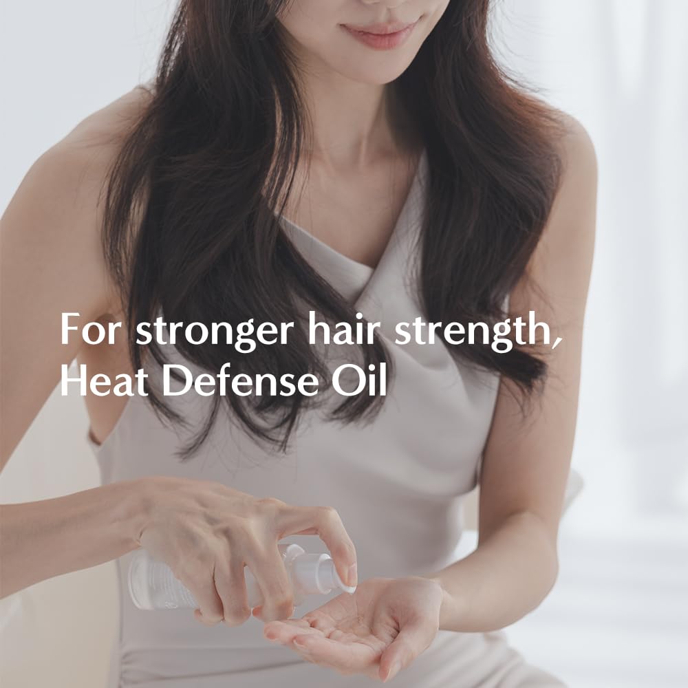 LORINIQUE Huile Yuja application sur cheveux nourrit et lisse sans lourdeur.